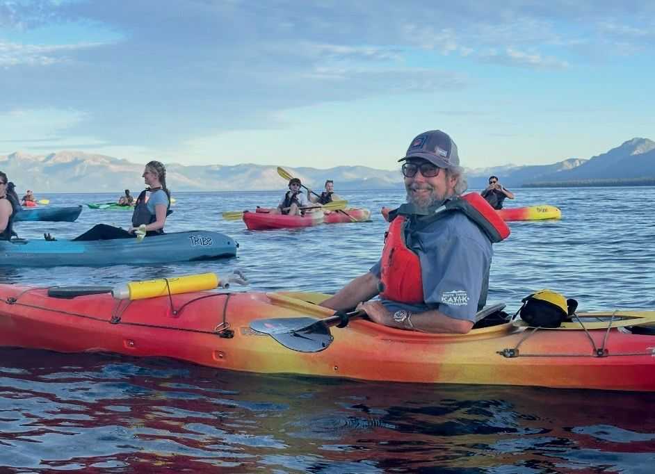 Kayak guide with customers on Lake Tahoe