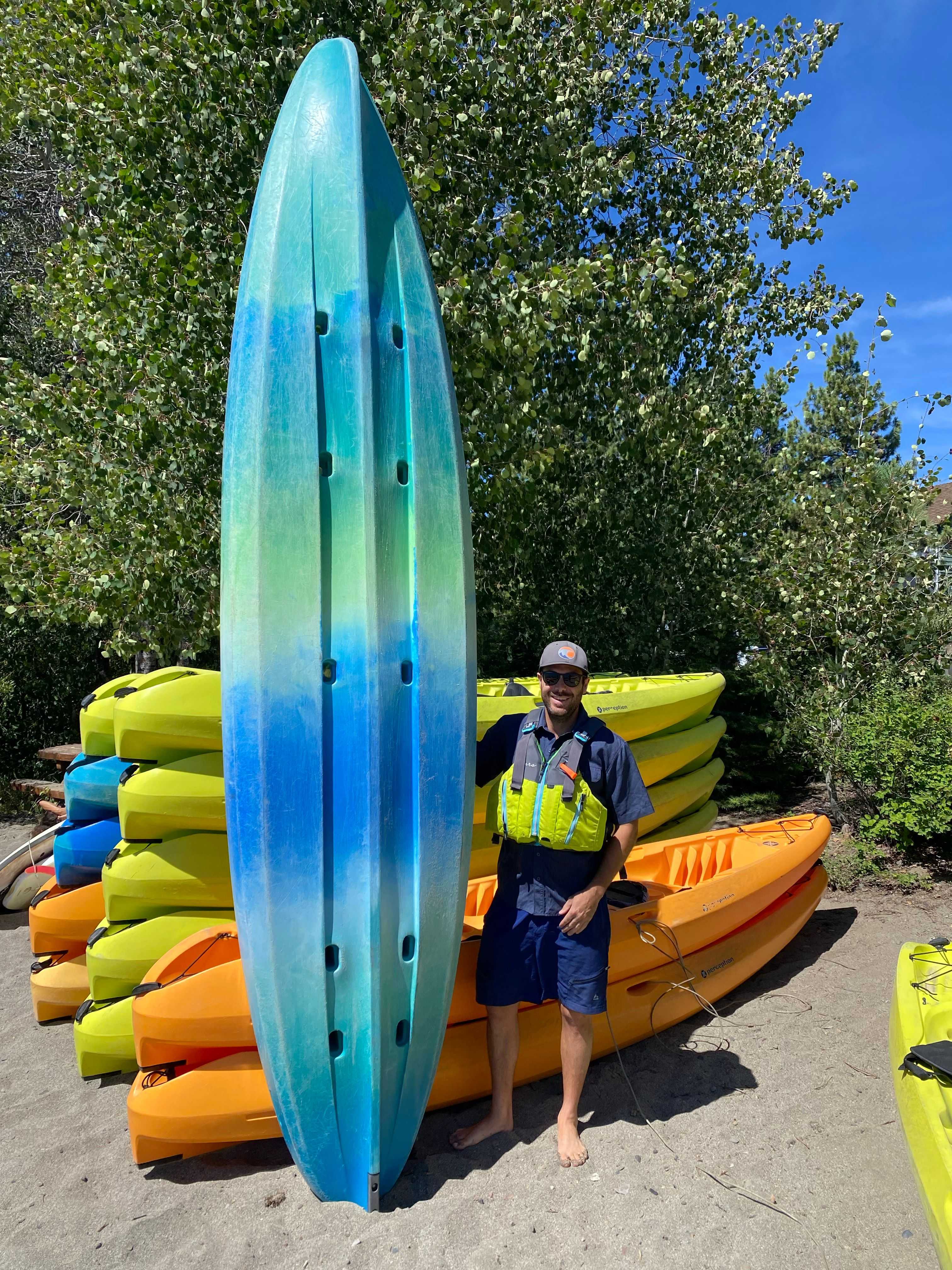 kayak guide getting the boats ready
