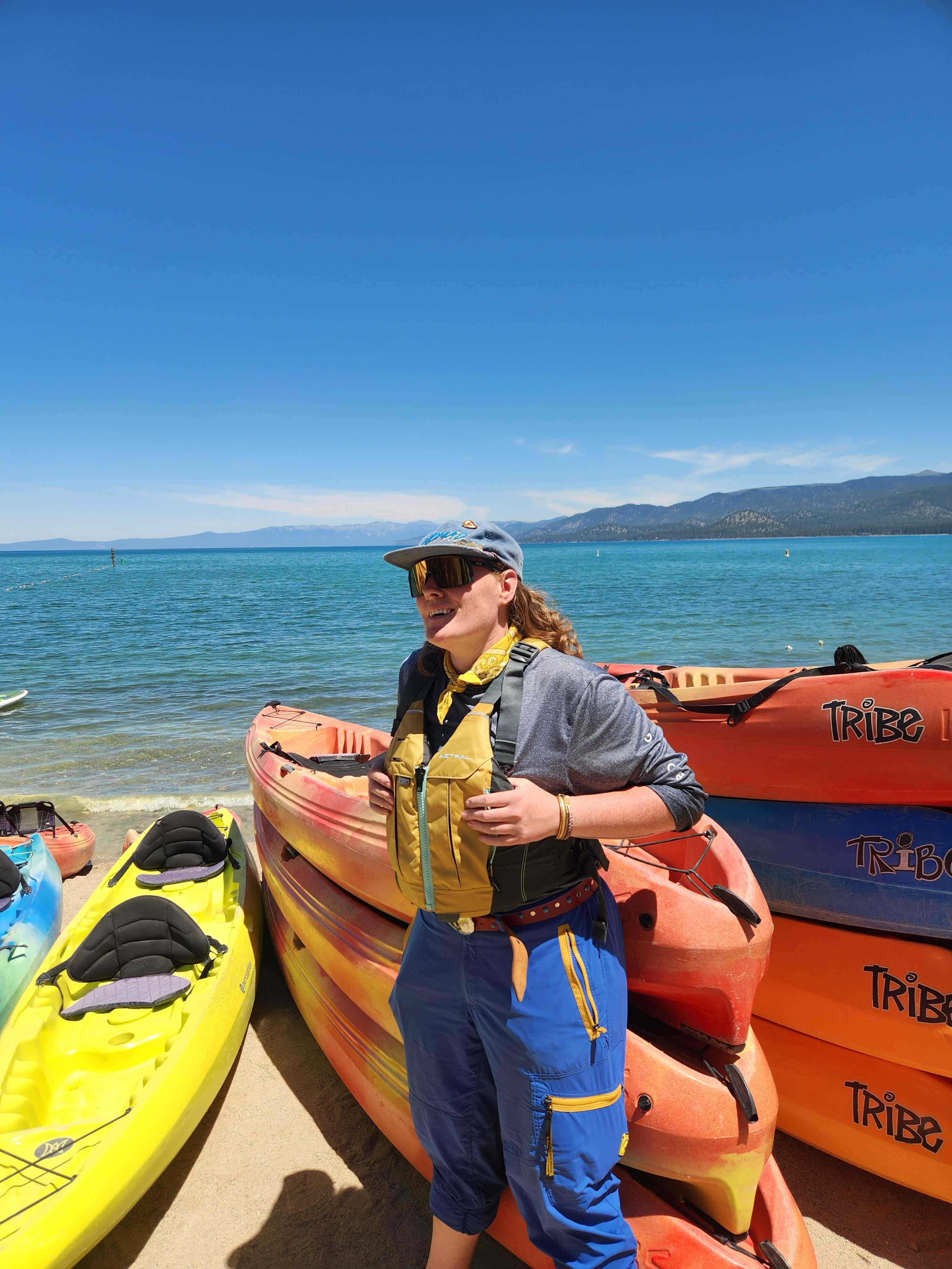kayak guide prepping on the beach
