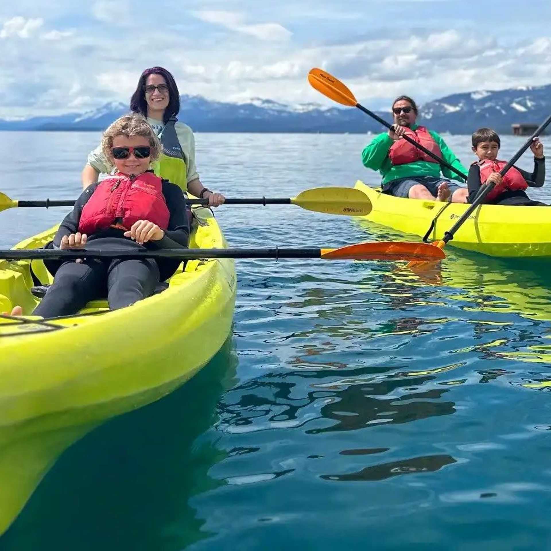 family kayaking on Lake Tahoe